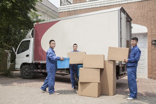 Moving team preparing belongings with protective handling in South Kensington