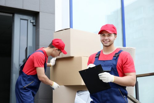 Man and van moving boxes in a South Kensington street