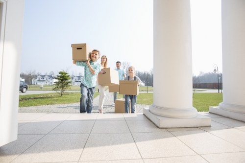 Removal van and packing boxes prepared for a South Kensington home move