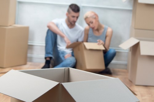 Moving boxes and furniture being prepared for a home move in South Kensington