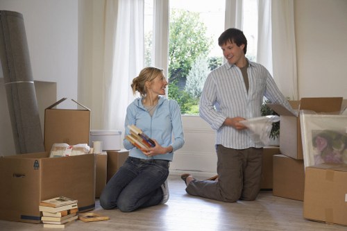 Packed boxes and furniture prepared for removal truck hire