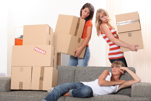 Loading furniture into a truck near South Kensington flats